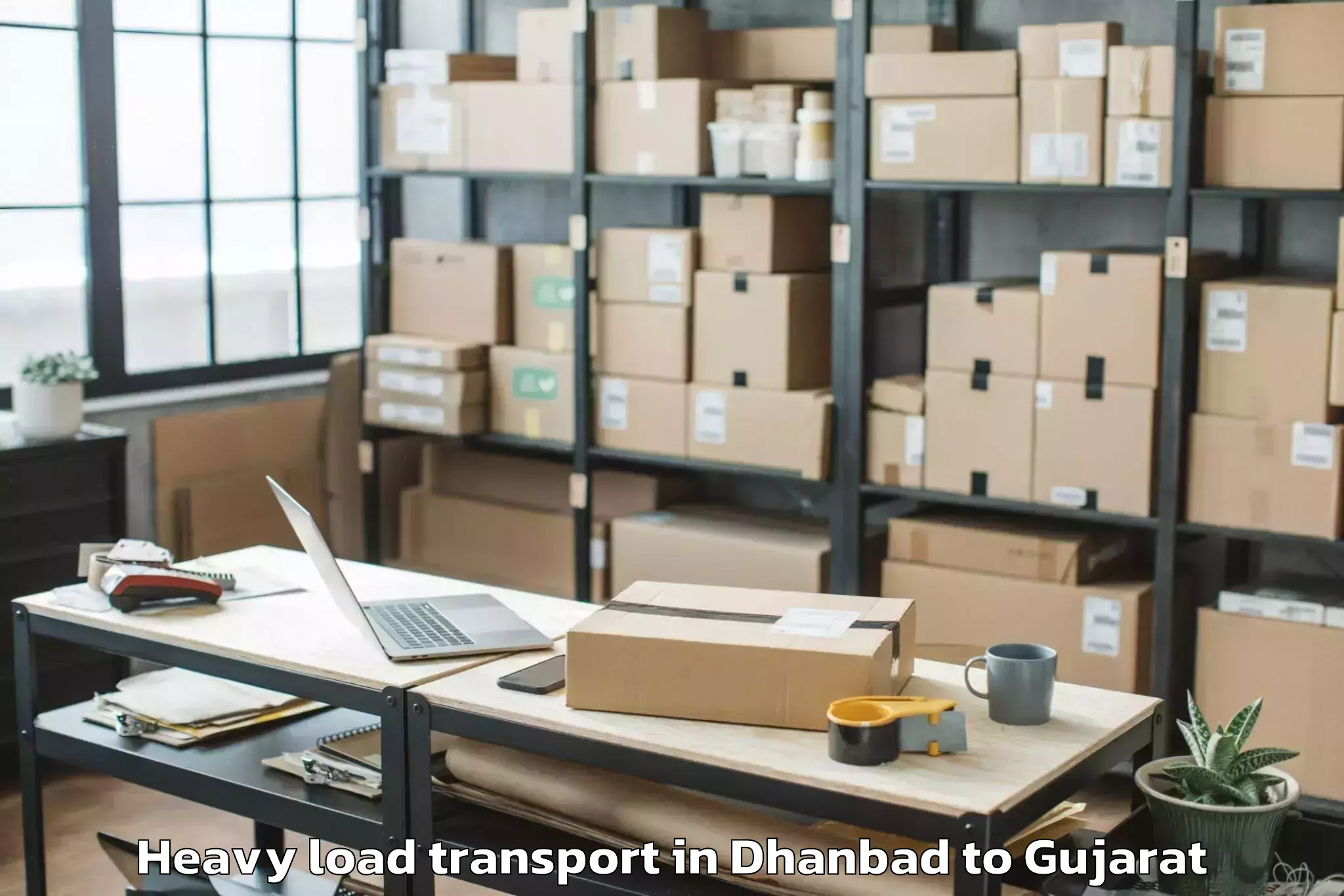 Easy Dhanbad to Porbandar Heavy Load Transport Booking